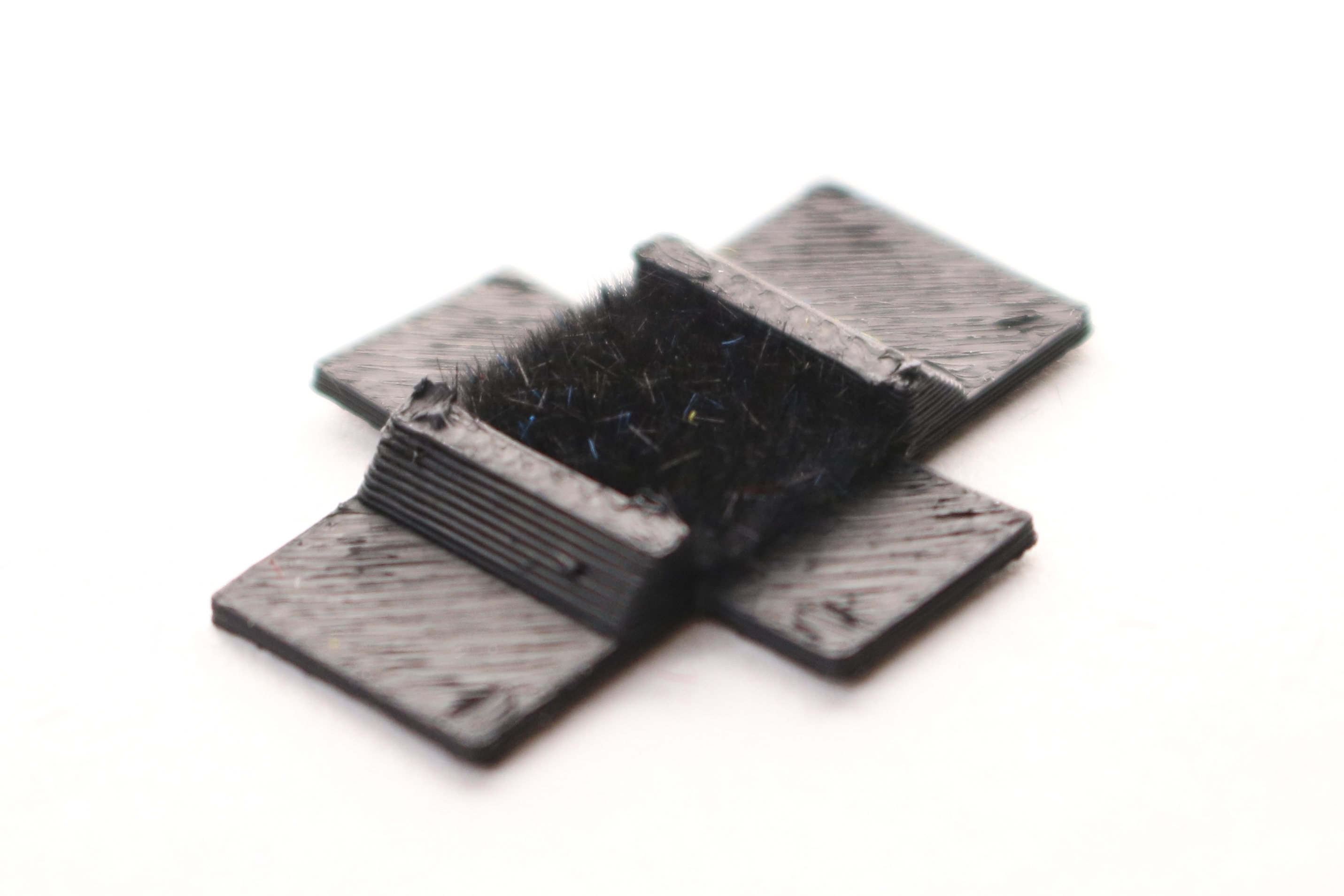 Programmable Electrostatic Flocking — structural modulation detail